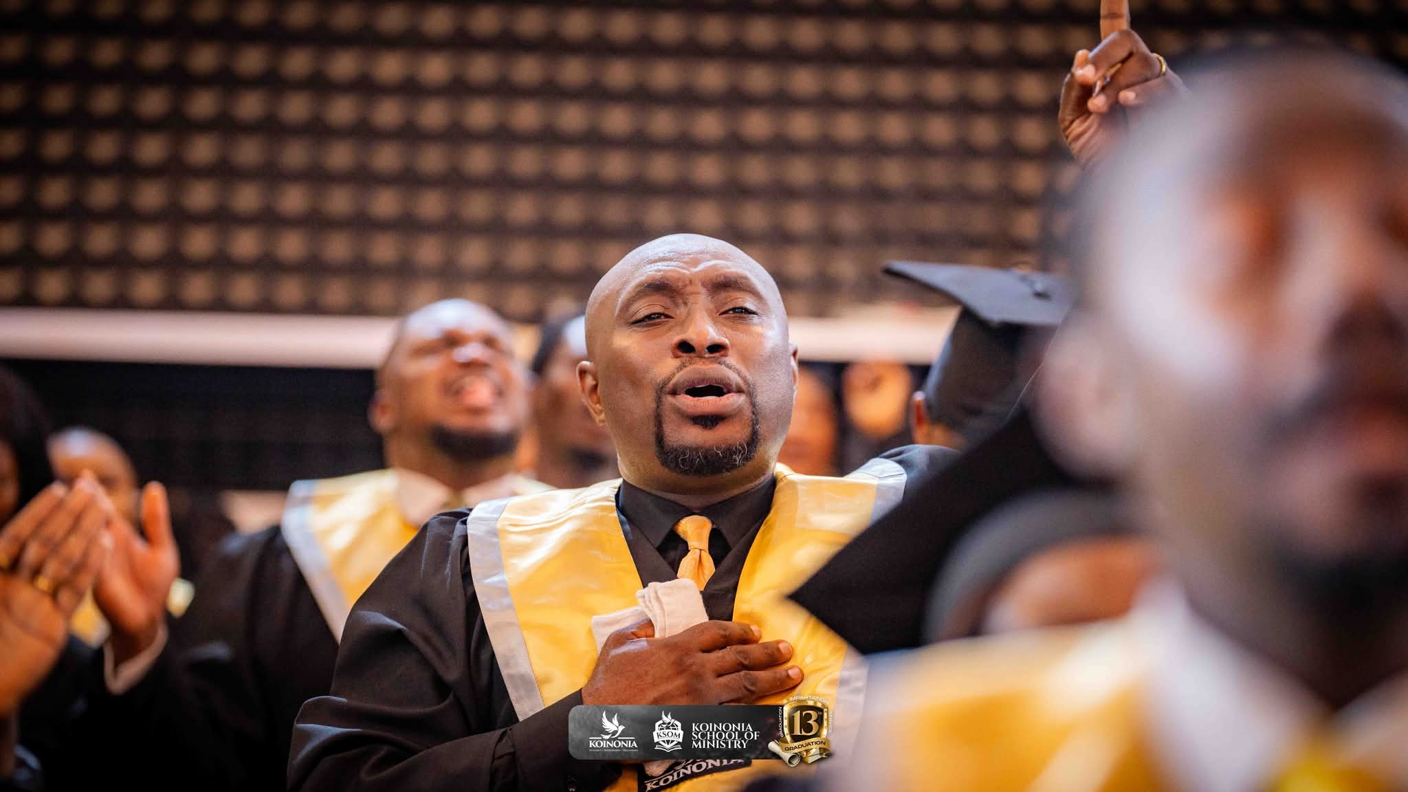 Happy graduants worshipping