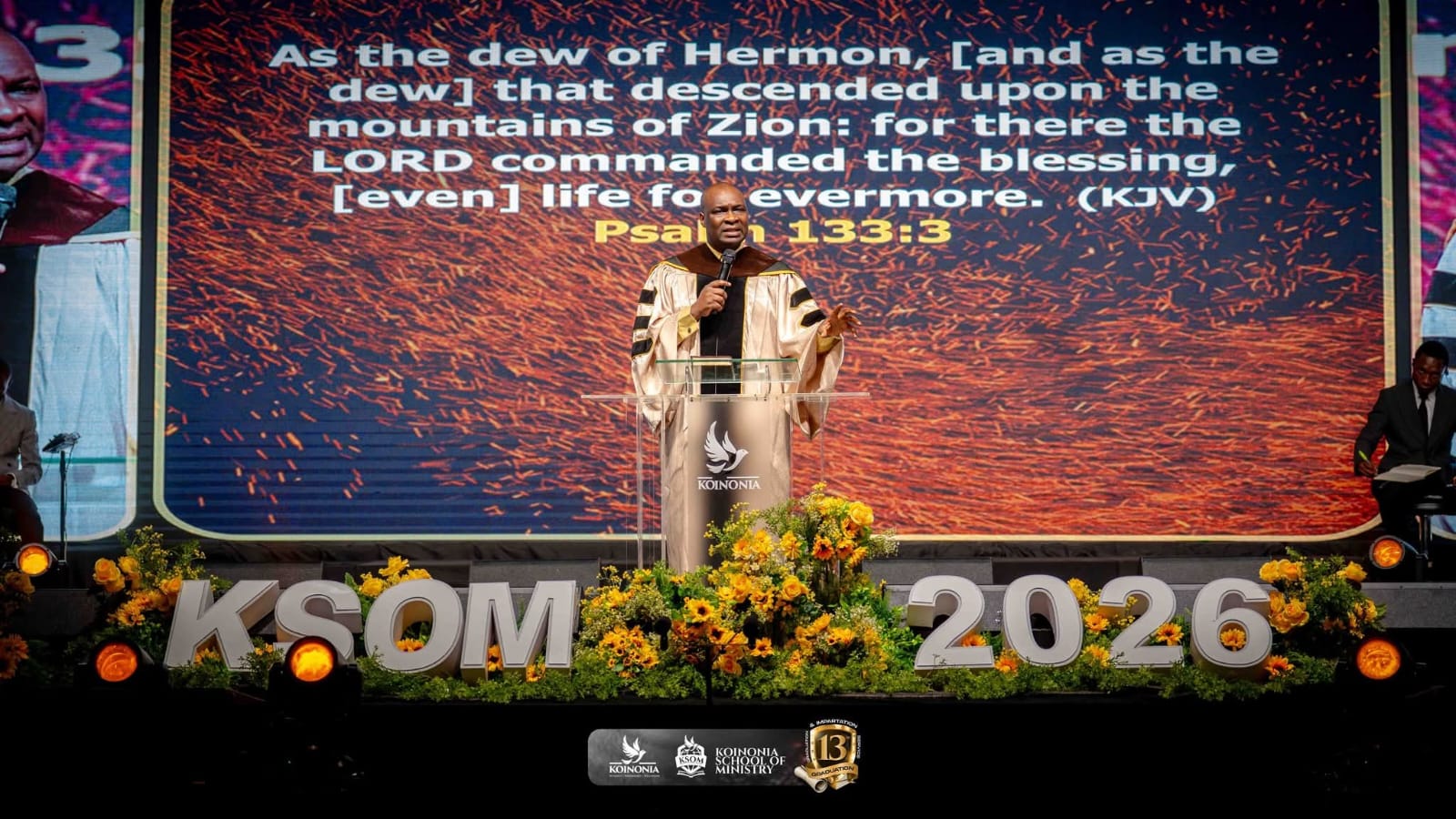 AJS Standing reading the scripture on stage