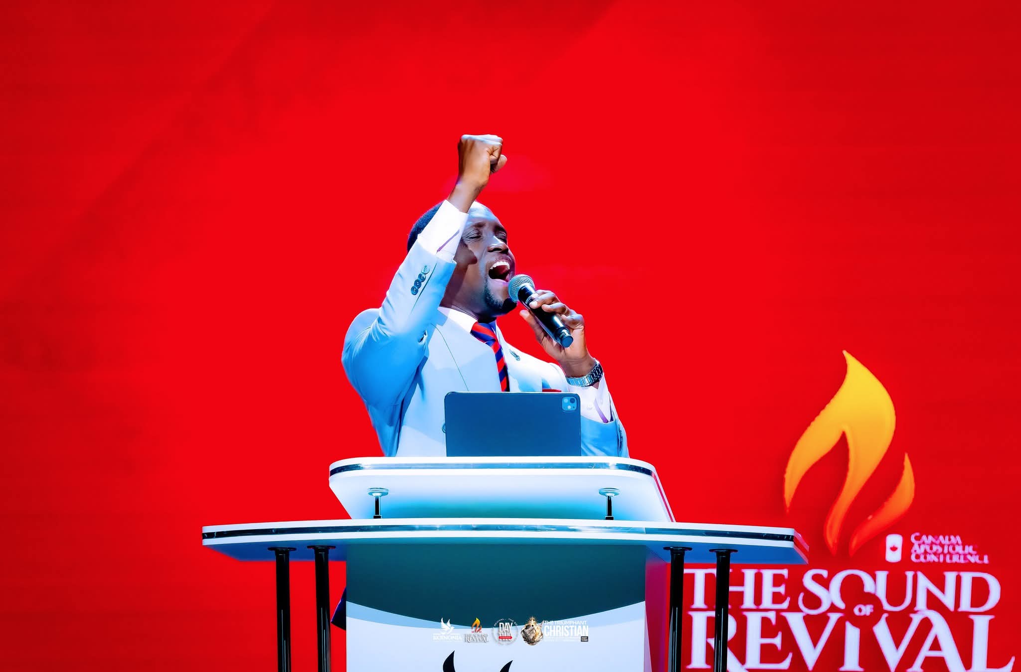 a minister on stage during Testimony