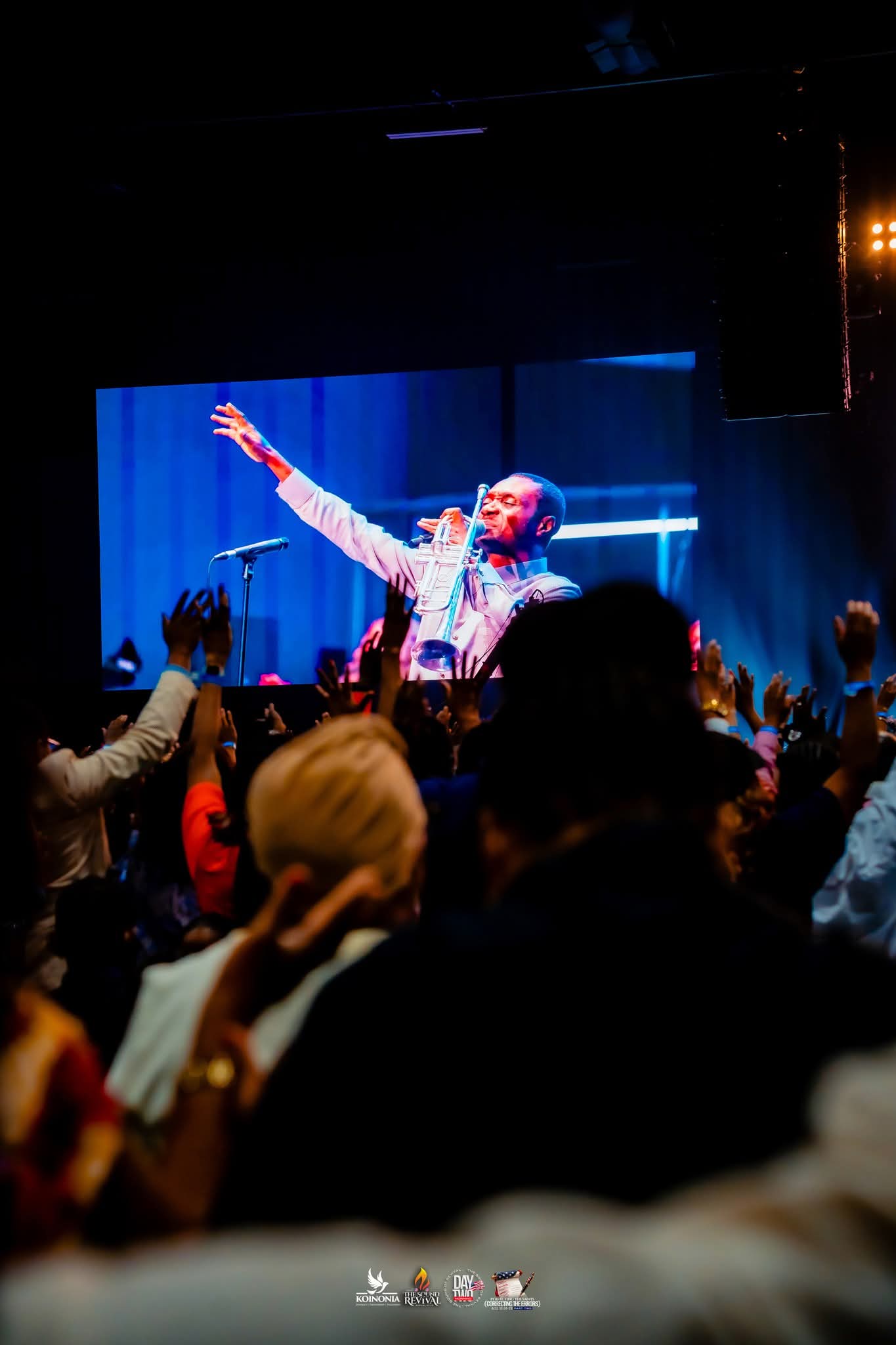Pastor Nathaniel leading worship