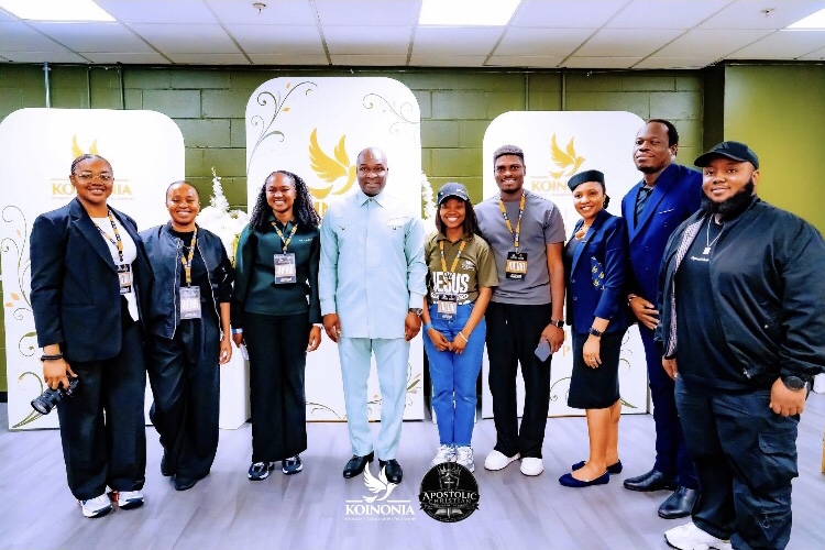Apostle Joshua with a group of workers